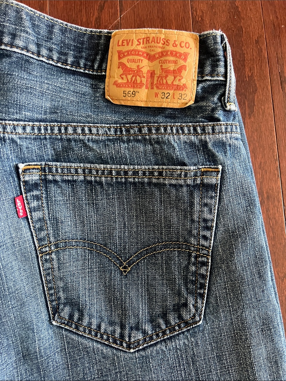 Levi's Men's Straight Jeans in Denim Blue with Tan Patch